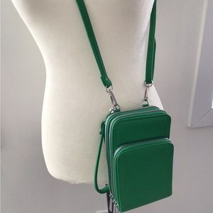 Small Crossbody wristlet 3 compartment wallet.